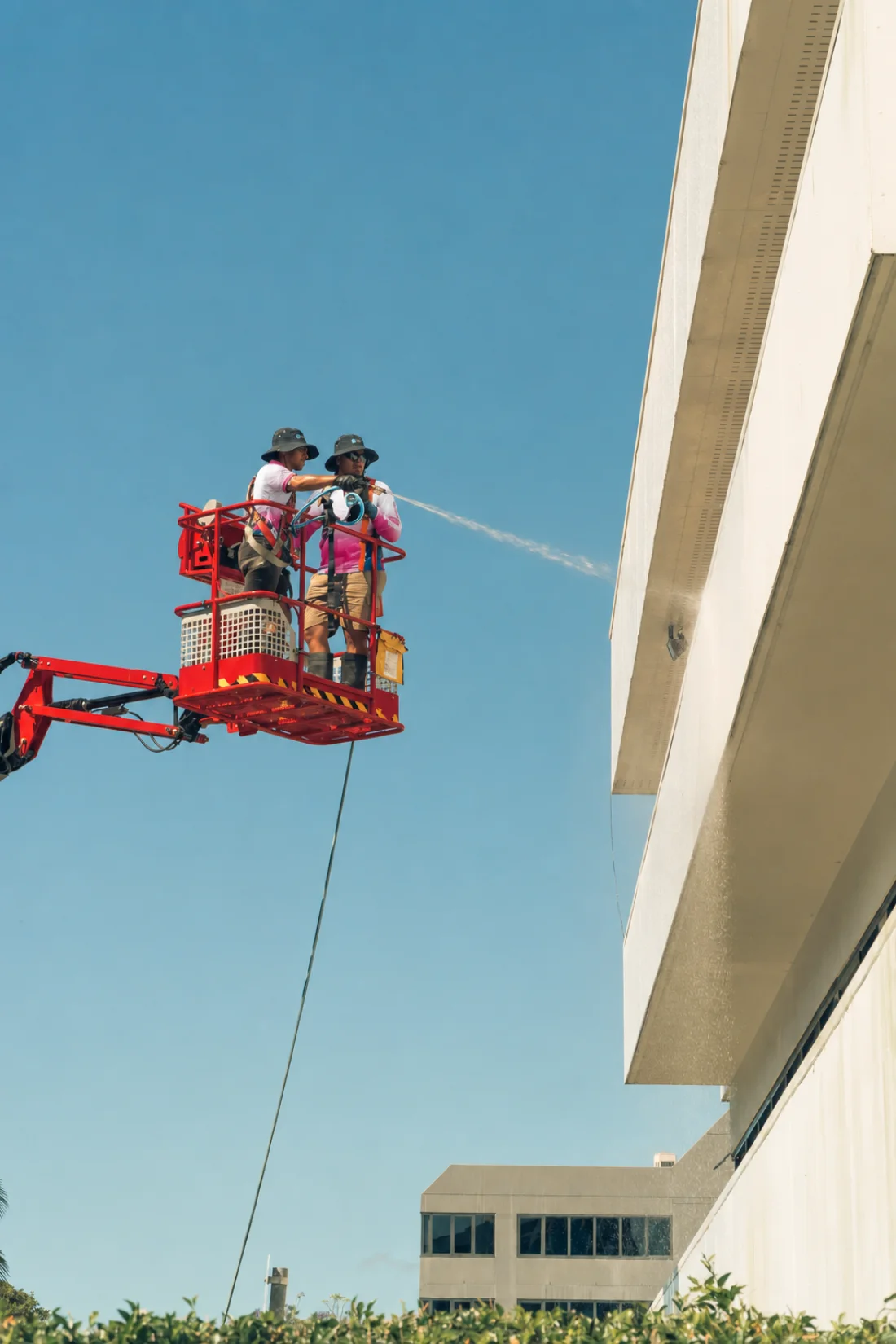 Koala team completing high-access exterior cleaning